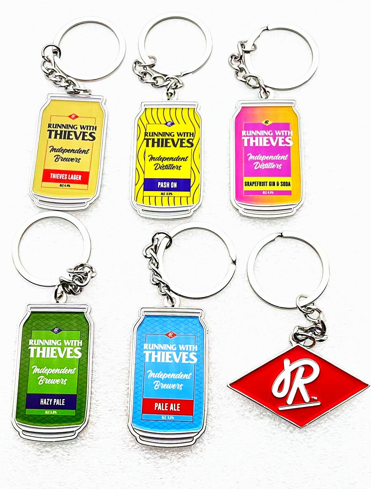 Custom can-shaped keyrings made by Brand36 for Running With Thieves: Thieves Lager, Pash On, Grapefruit Gin and Soda, Hazy Pale and Pale Ale, plus a red R logo keyring